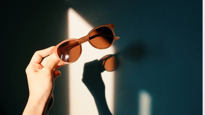 7. Wear Sunglasses Outdoors: Wearing sunglasses that offer 100% UV protection, even on cloudy days, can help you take care of your eyes. Prolonged exposure to the sun's rays can damage the eyes and increase the risk of conditions like cataracts, macular degeneration, and photokeratitis. Good quality sunglasses act as a barrier against these harmful rays, and help preserve long-term vision. (Image Source: Canva)